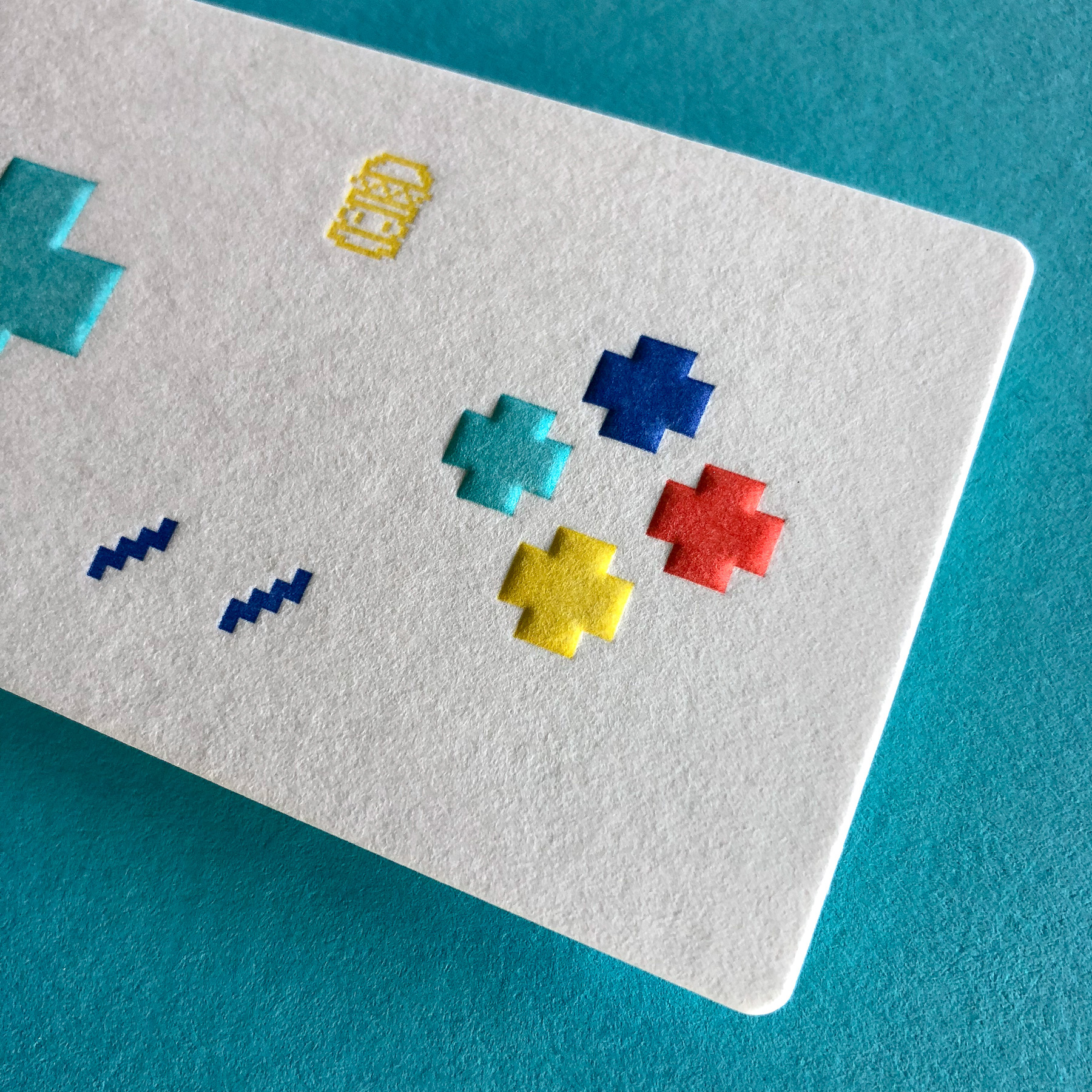 Unique letterpress embossed business cards for 8 Bit Burger on Wild 3
