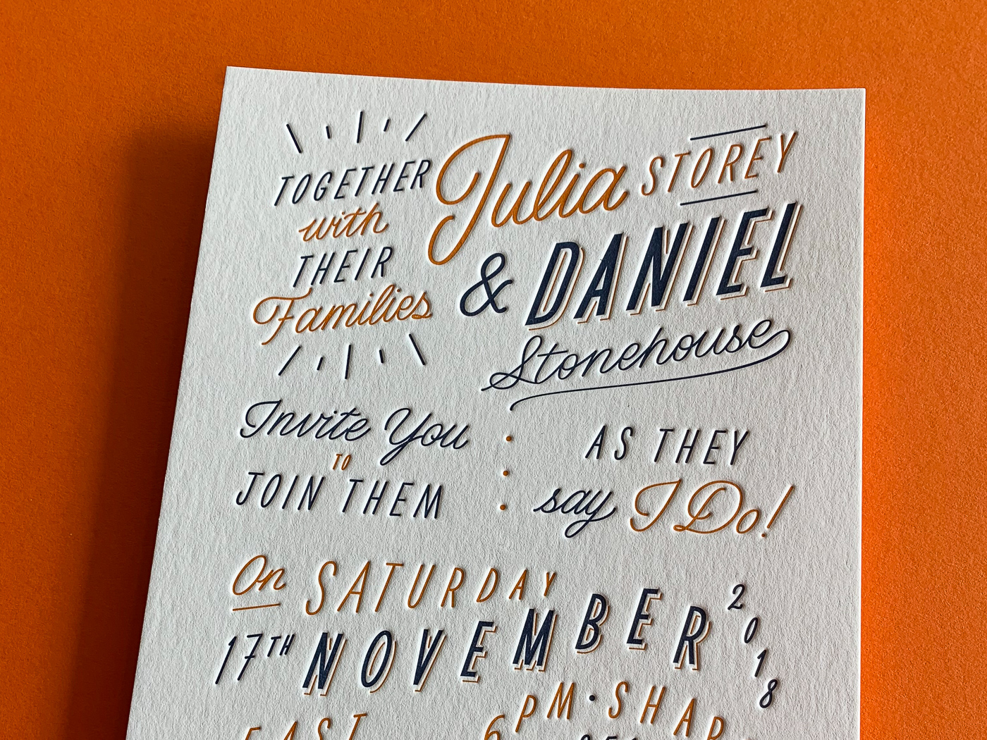 Custom typographic letterpress invitations on Wild